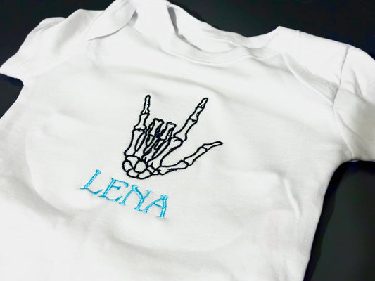 Skeleton Rock Hands Personalised Embroidered Baby Grow