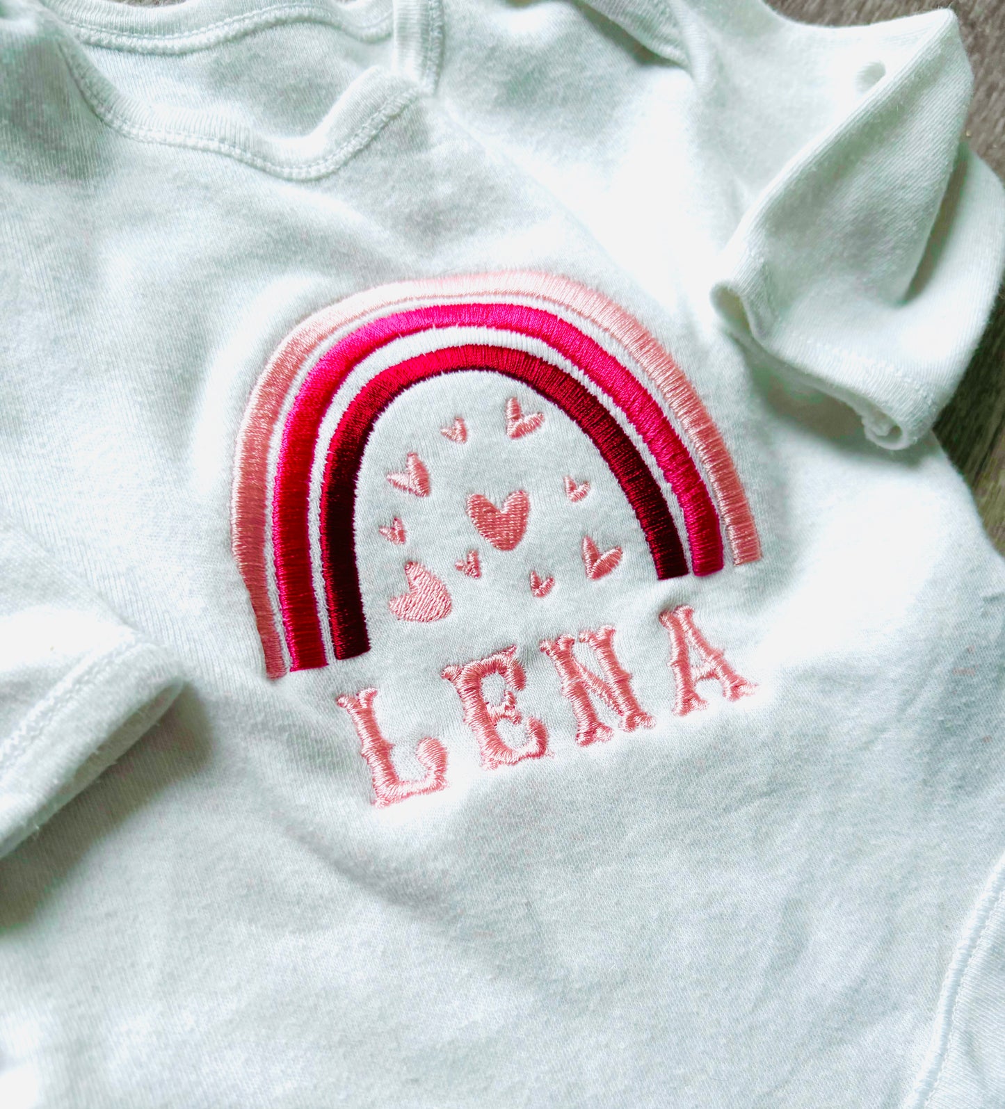 Rainbow With Hearts Personalised Embroidered Baby Grow
